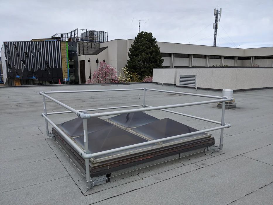 Metal railing is installed for height safety guards.