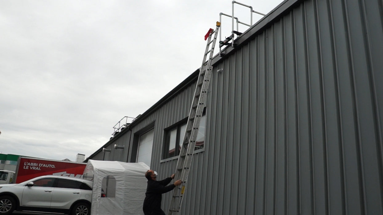 Ladder stabilizer installed for fall protection safety
