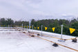 Yellow pennant flags with a pole for warning